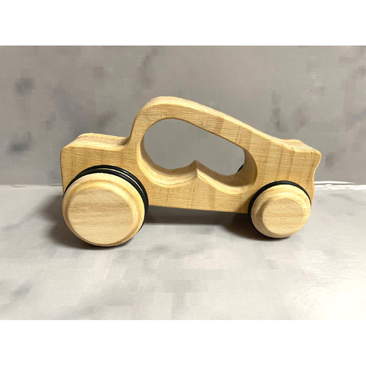 Car on wheels with handle