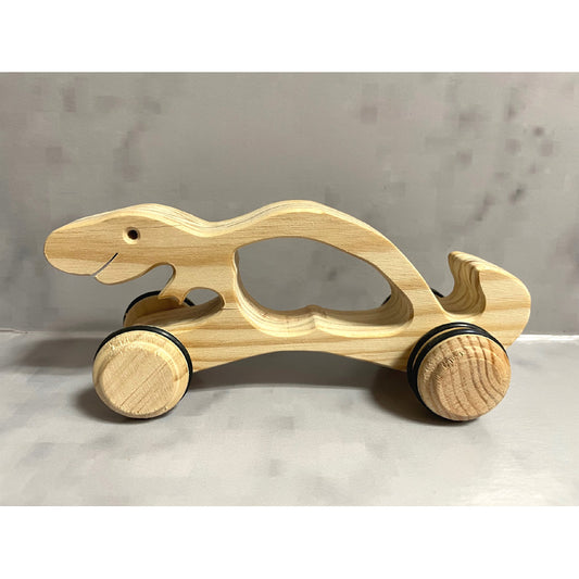 T-Rex on wheels with handle